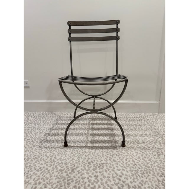 Four vintage Italian steel klismos–curule chairs, stamped Made in Italy and purchased there in the mid 70s. Dark silver in...