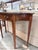 A beautifully crafted console table by Hammary, inspired by classic Federal design and distinguished by its graceful...