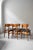A set of six chairs from Denmark from the 1960s. The teak wood has been renovated to a soft matte finish, the original eco...