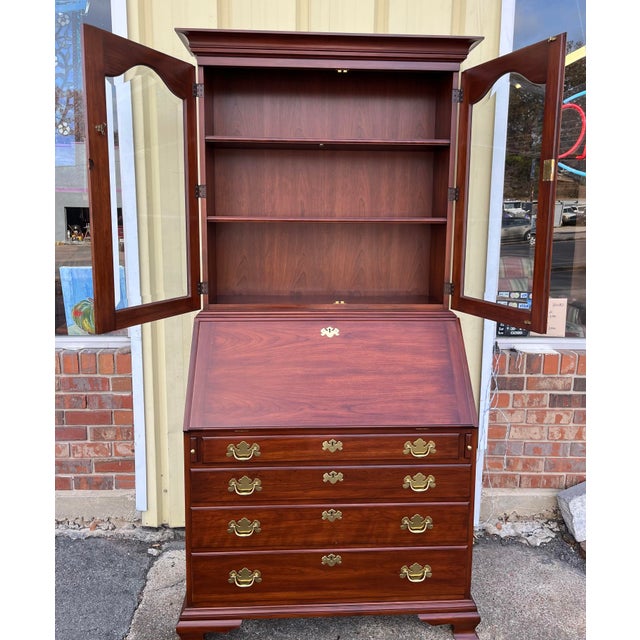 Beautiful, high quality solid cherry secretary bookcase by Henkel Harris. Glass door upper cabinet, drop down secretary...