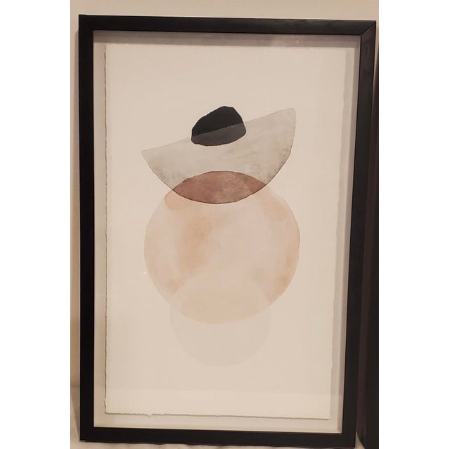 Bring a sophisticated gallery aesthetic to your space with this striking pair of contemporary abstract watercolor prints...