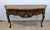 Century furniture French provincial Console table is fastidiously crafted from rich walnut and features an intricate...