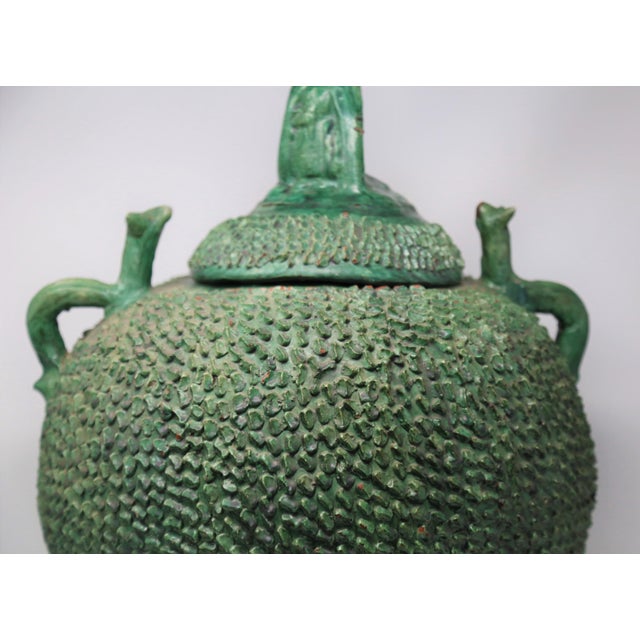 Unique and large green mexican pot/urn. A statement piece in any decor.