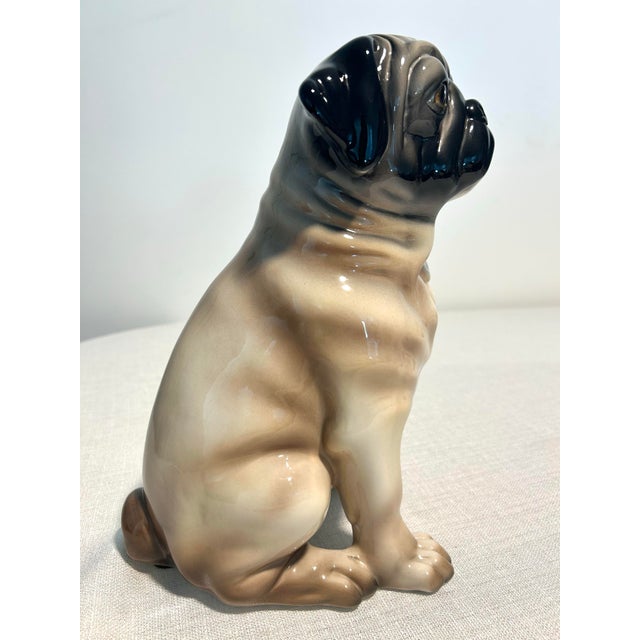 This MCM Gump’s hand-painted porcelain pug captures all the charm and whimsy of mid-century decorative design. Carefully...