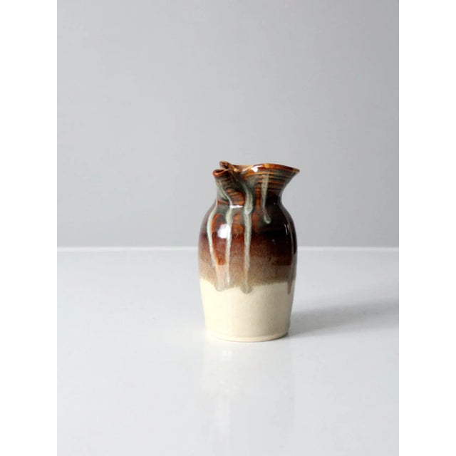This is a hand-crafted studio pottery creamer pitcher signed by the artist, William Black. Beautiful brown and blue...