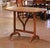 Celebrate the art of entertaining with this antique "Table de Vigneron" from France, crafted circa 1870. Fashioned from...