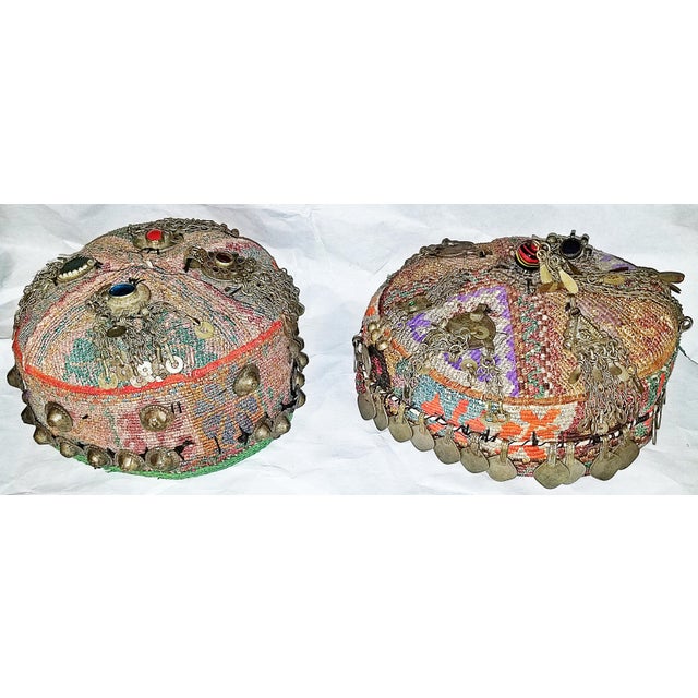 An amazing set of 2 Afghani wedding hats woven in wool, silk with semi-precious stones including lapis lazuil (an Afghani...