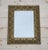Antique Neoclassical Style Wall Mirror. A rectangular mirror with brass, showcasing shells and bleeding hearts. This...