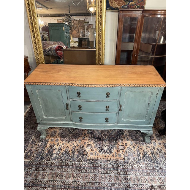 Beautiful mahogany sideboard, finished in a soft painted and gently distressed blue that highlights its elegant...