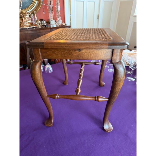 Vintage Walnut Cane Seat Cabriole Leg Spindle Stretcher Piano Bench with Removable Cushion. Fine condition, sturdy and...