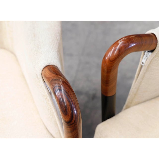 Umberto Asnago's wing armchairs for Giorgetti / Progetti in Bouclé wool fabric. This piece has an attribution mark, I am...