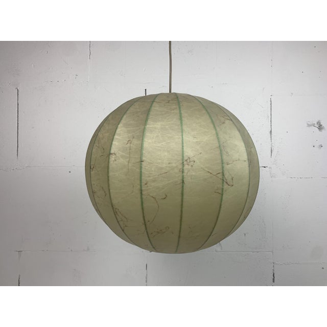 Although often attributed to Achille & Pier Giacomo Castiglioni for Flos, these cocoon lamps are generally made by...