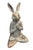 This charming vintage cast iron statue depicts a stylized hare captured in a serene, meditative pose. Seated cross-legged...