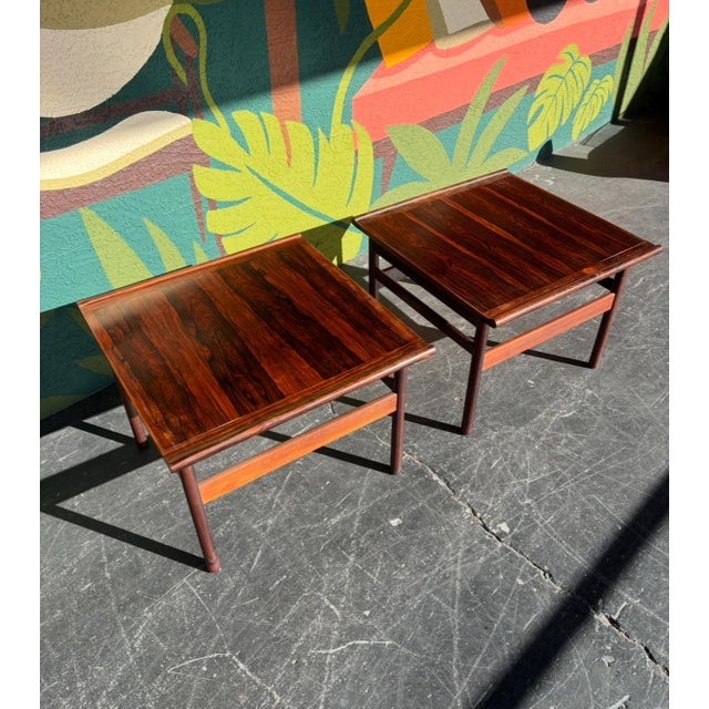 Norwegian end tables for the collectors and enthusiasts of rosewood furniture. Striking grain and floating table design...