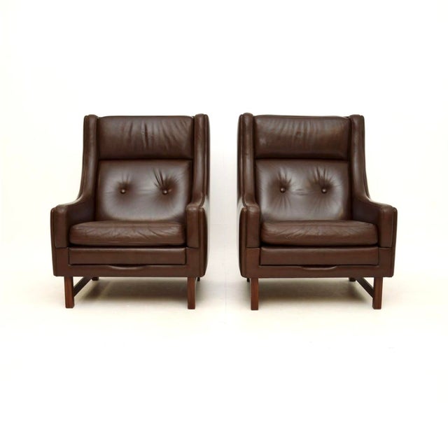 A smart and extremely comfortable pair of vintage leather armchairs by Torbjorn Afdal for Bruksbo. They were made in...
