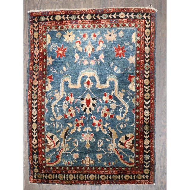 An early 20th-century Sarouk Ferehan mini rug Details rug no. j4482 size 1' 9" x 2' 4" (53 x 71 cm)