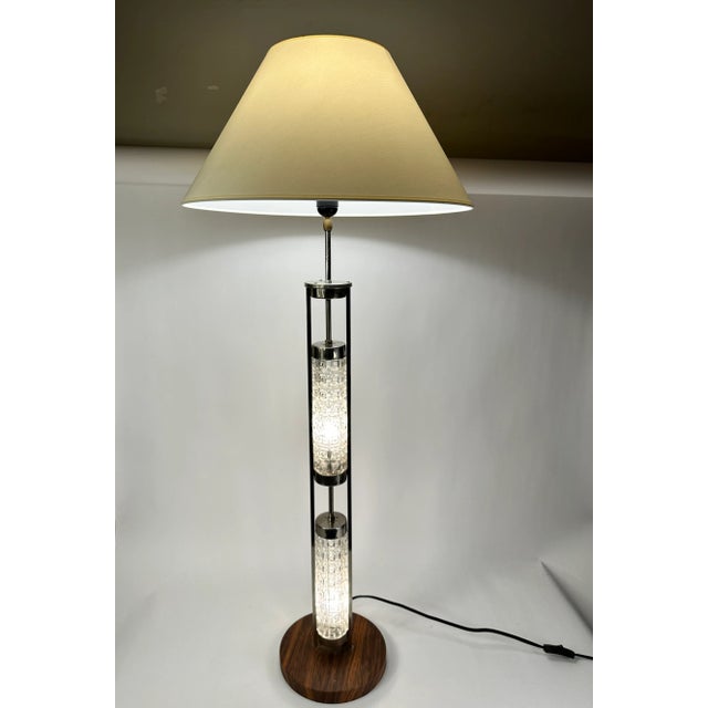 A stacked cut glass lamp with walnut base. All lights do light at the same time with one new toggle switch. The base is...