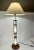 A stacked cut glass lamp with walnut base. All lights do light at the same time with one new toggle switch. The base is...