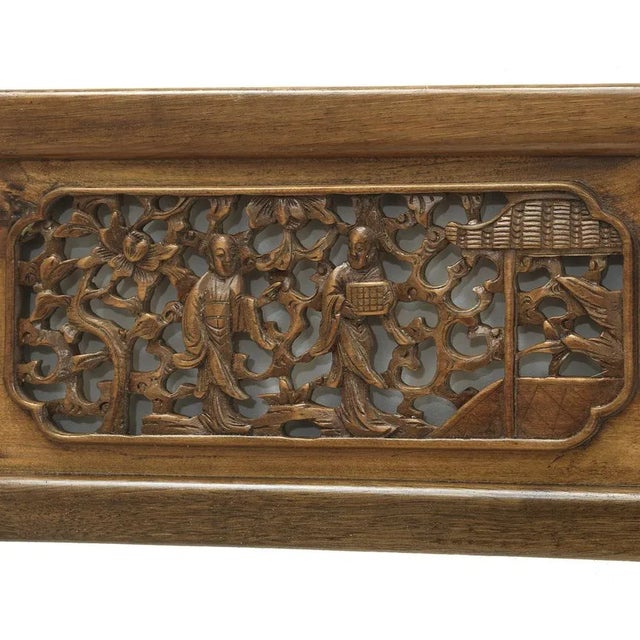 This exquisite, long horizontal panel from Jiangsu province, China was crafted in 1880 out of elm and enhanced with a...