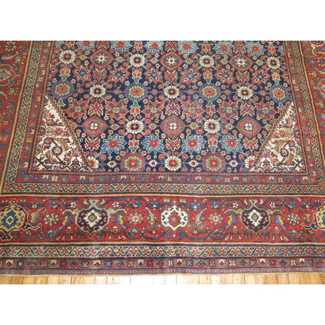 Stunning Navy Blue Field Persian Mahal Rug with an all over- design in an array of other lively colors. Colors and...