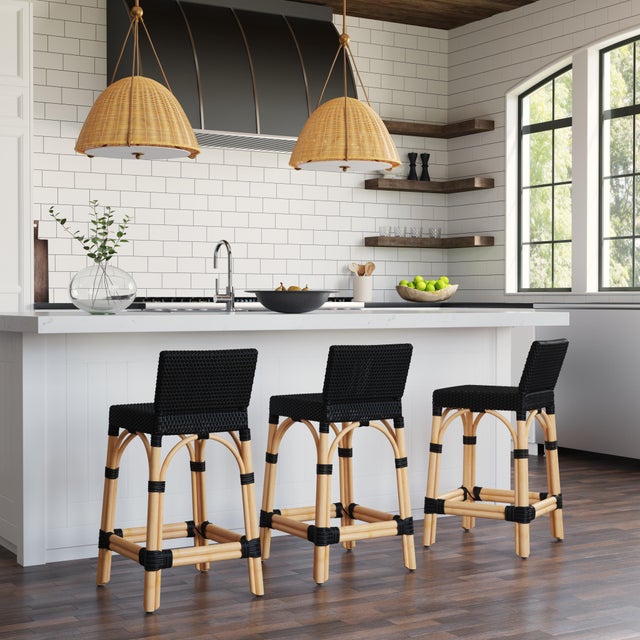 Combining clean lines with tropical materials, this Butler Specialty Company stylish low back counter stool infuses modern...