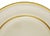 Elegant set of six antique Minton luncheon plates in a warm cream color with refined gilt trim. Their neutral palette and...