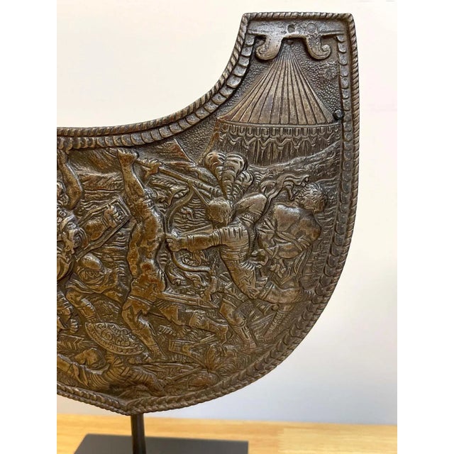 19th c Grand Tour Roman style iron gorget on stand Decorated with a intense battle scene with Imperial Roman soldiers...