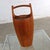 Handsome and iconic staved teak ice bucket by Jens Quistgaard for Dansk. This is the monumental 19.25-inch-tall example....