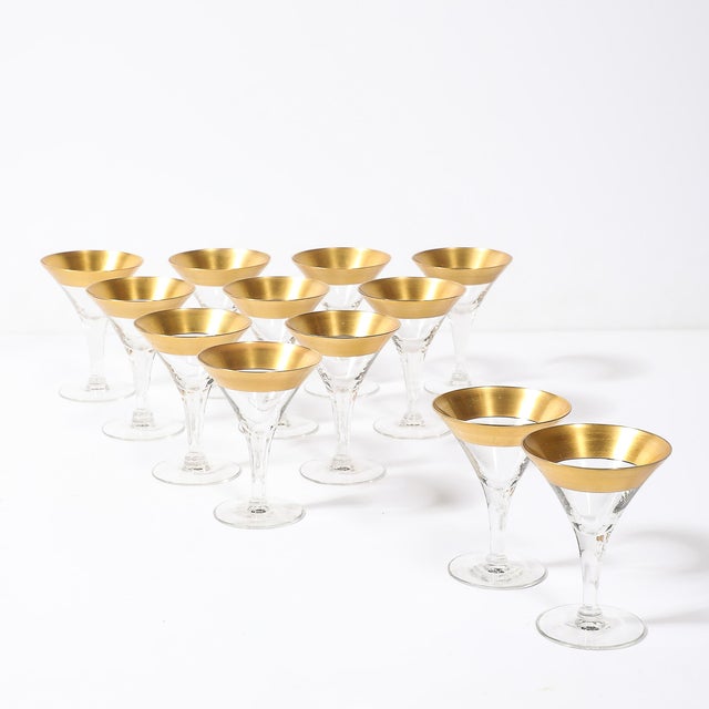 This set of 12 Mid-Century Modernist gilt-rimmed coupe glasses, designed by the iconic American glassware designer Dorothy...