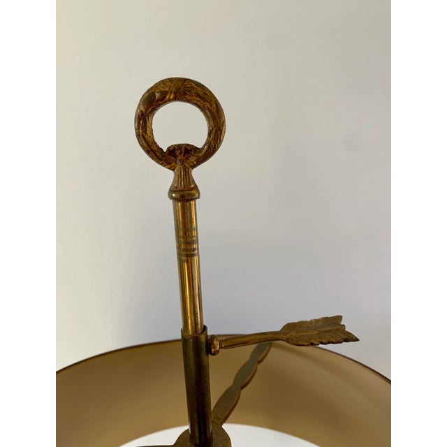 A gorgeous brass three-arm horn bouillotte lamp with red & gold tole shade USA, Mid-20th Century Measures: 13"W x 13"D x...