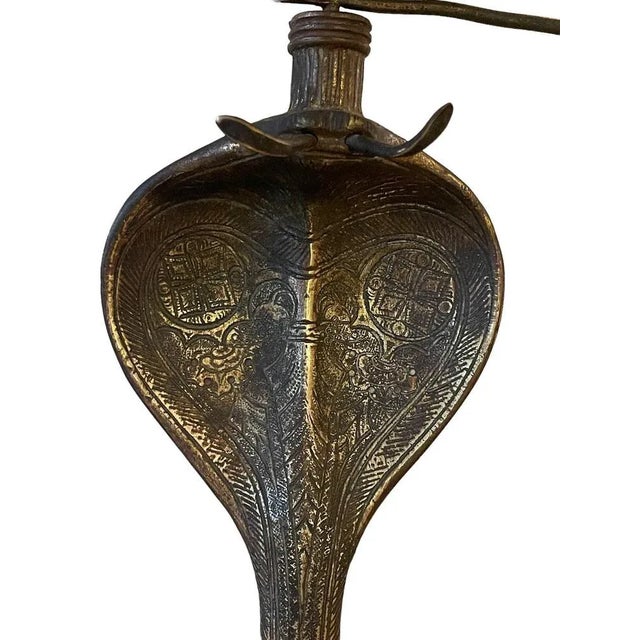 Oriental bronze gong, cobra-shaped Oriental gong, 20th century, richly decorated with human figures, bronze stand, crafted...