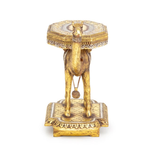 AFD Home Silvered and Gilded Wood Camel Form Side Table, with octagonal top. 26.25" H x 23.5" W x 14.5" D. Provenance:...