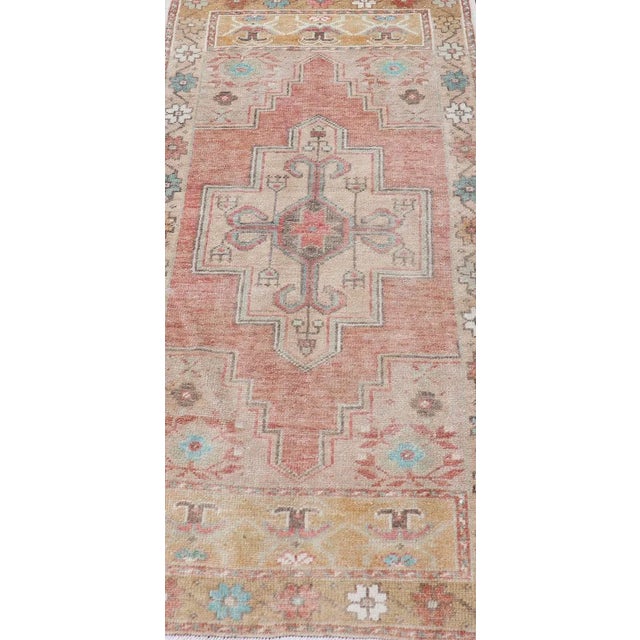 Tribal Faded Coral and Taupe Vintage Turkish Oushak Rug With Layered Medallion Design 2'6 X 5'0 For Sale - Image 3 of 11