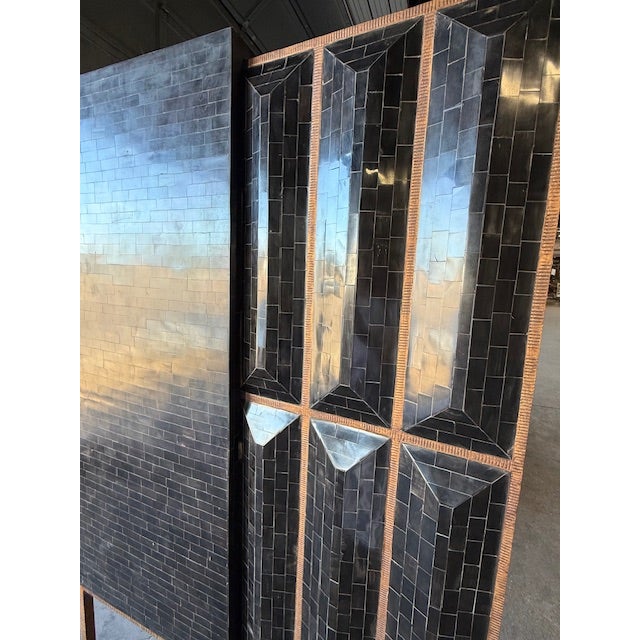 Make entertaining easy with the Horn Inlay Bar Cabinet, It is a piece of art with each piece of buffalo horn is...