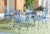 Gracious dining begins with this charming Victorian style five piece Thessaly Outdoor Set in antique blue iron for a...