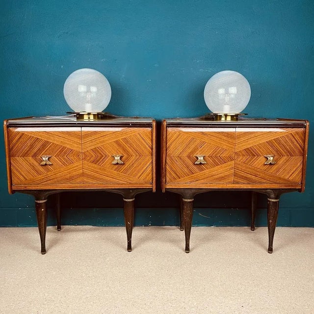 The pair of vintage Murano glass night table lamps were made in Italy in the 1970s. Very beautiful white glass with bends...