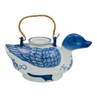 Vintage Blue and White Chinoiserie Ceramic Duck Teapot With Rattan Wrapped Handle For Sale