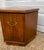 Classic mid century Drexel cabinet-style side table with brass campaign-style hardware. Solid wood construction which...