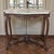 Early 20th century Louis XV marble top center table with a beautifully carved walnut base, shaped cabriole legs, and a...