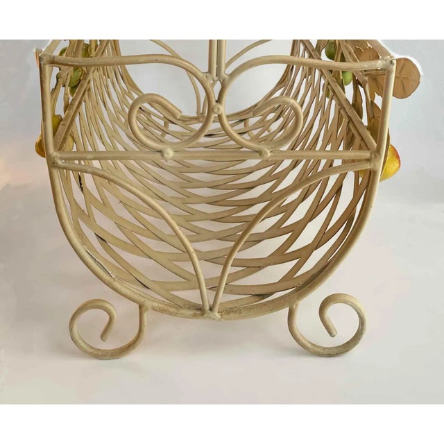 Vintage Italian tole magazine rack. Basket weave with fruit design.