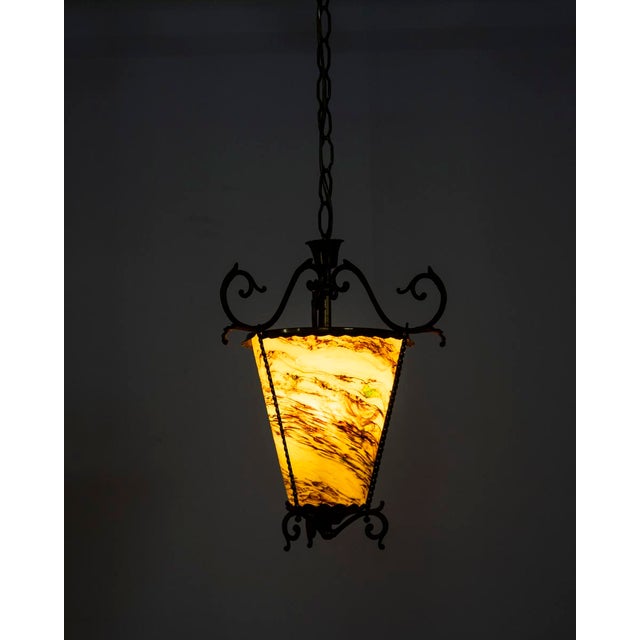 Lantern chandelier with golden brass structure and multicolored glass lampshade, Italian design, 1950s. Up to 250V...