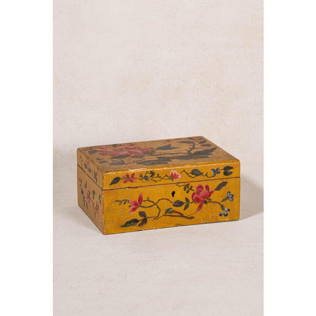Vintage wood box with hand-painted floral decoration on all sides and the lid. Features a hinged lid and keyhole. Use for...