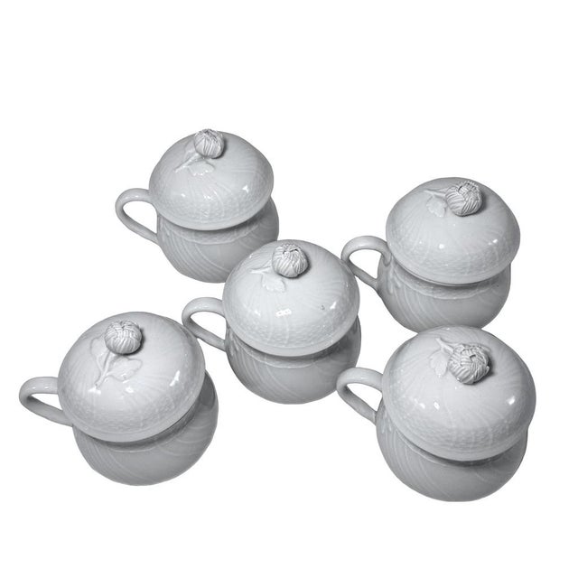 A refined set of five Richard Ginori covered pot de crème cups in glossy white Italian porcelain. The Vecchio Ginori form...