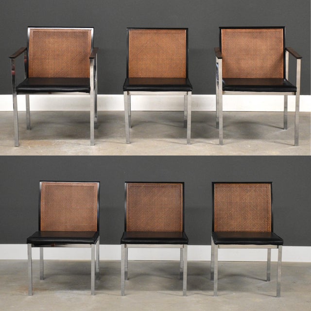A set of six mid century modern chome dining chairs with cane backs and rosewood arms designed by Paul McCobb for Lane....