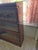 This is an antique Globe-Wernicke wooden barrister bookcase featuring a modular design with three stackable glass-front...