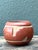 This exquisite vintage red clay pottery bowl is a stunning example of Southwestern artisanal craft. Hand-thrown and...