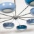 Metal Early 21st Century Ten-Arm Starburst Chandelier with Blue Shades For Sale - Image 7 of 13