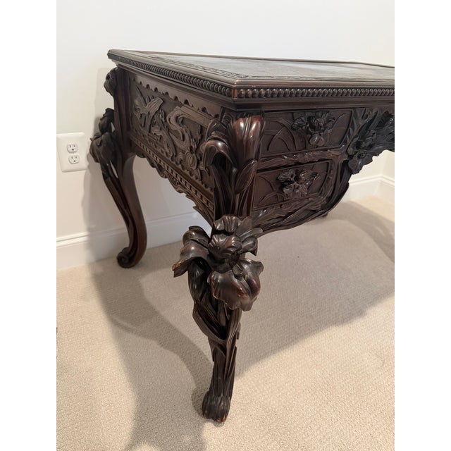 This exquisite French Art Nouveau writing desk dates to the late 19th or early 20th century and is richly hand-carved from...