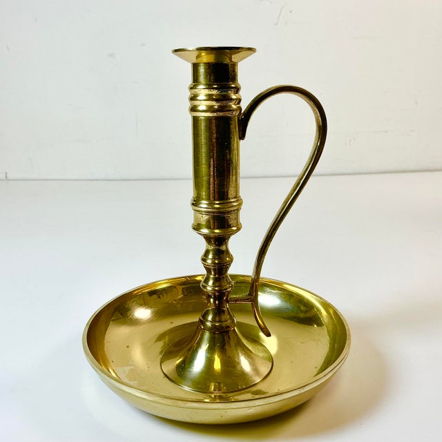 The design of this brass bedside candle holder is classic. It’s a large holder and features a tall handle and generous wax...