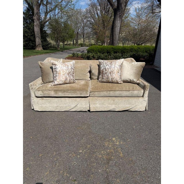 This two seat sofa pairs a tailored silhouette with exceptional comfort. Upholstered in a champagne velveteen fabric and...